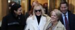 E. Jean Carroll and lawyers smiling after jury awarded her $83.3 million from Donald Trump. Image: SkyNews screengrab